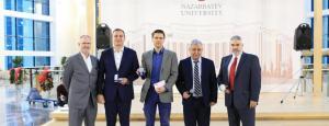 School of Science and Technology professors Anton Desyatnikov and Alexander Tikhonov were given the award "Білім берудің құрметті қызметкері" (”Honourable figure in a field of education”) and this honor was marked with them receiving insignia badges. Dr.